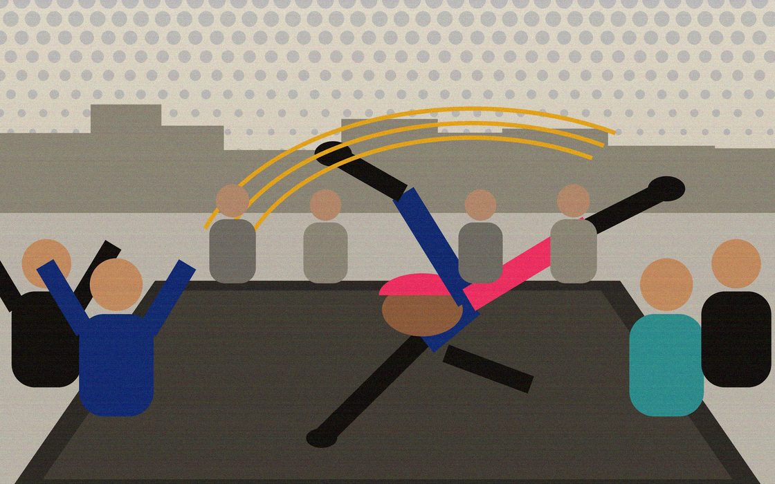 A dancer holding a freeze on lino while a circle of onlookers watches