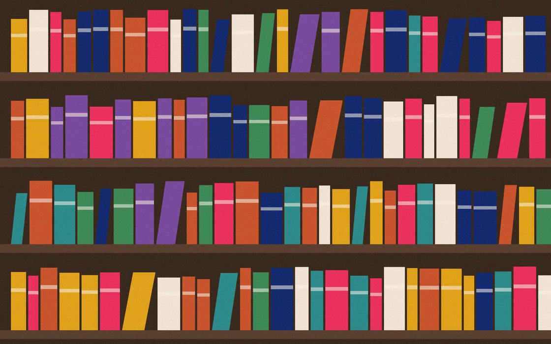 A full library swap shelf stacked with donated books beside a reading window.